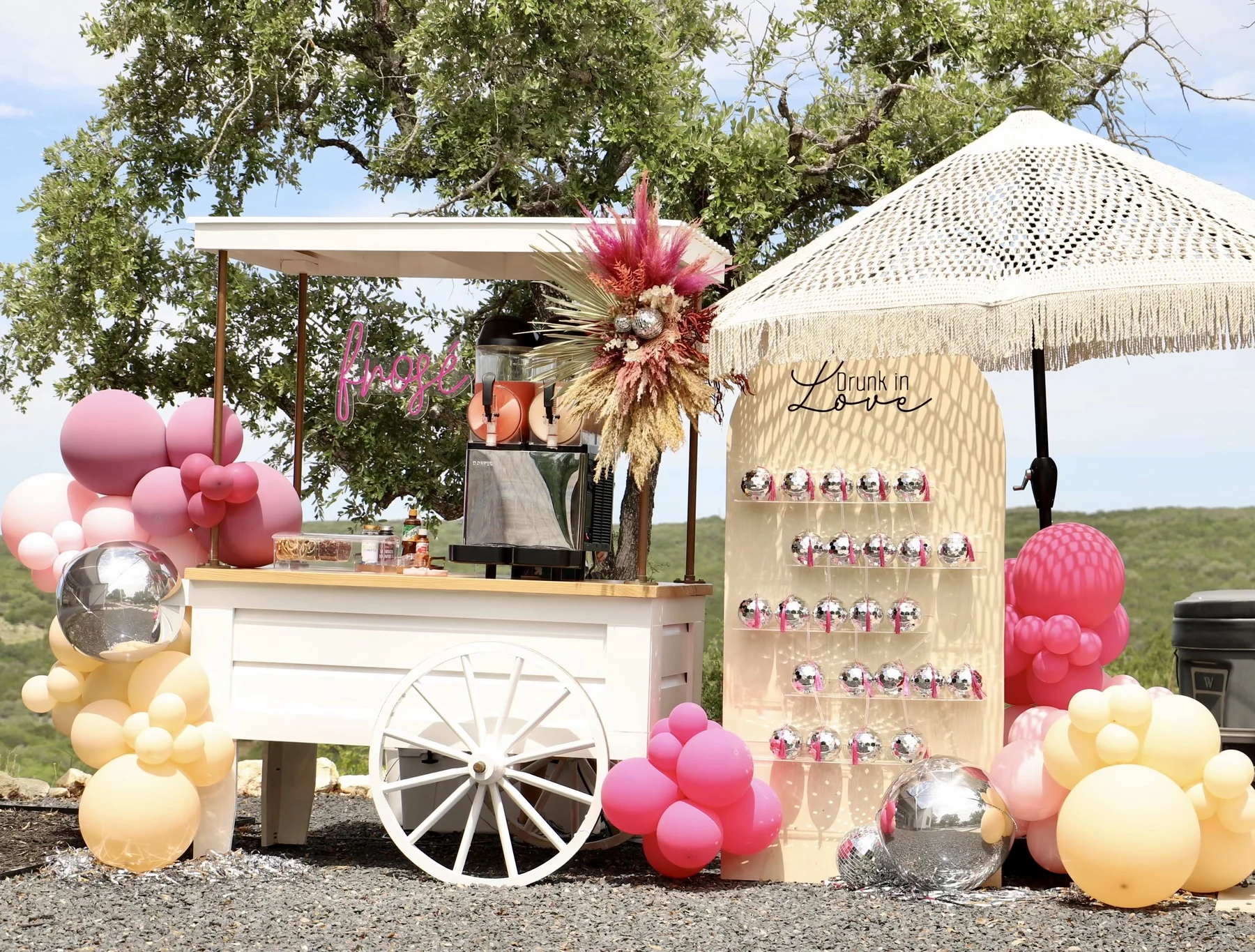 Austin bridal shower bar cart, favor wall and balloon styling