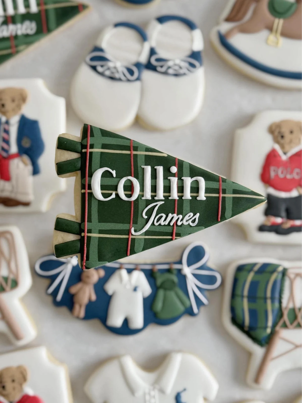 Custom baby-shoe and clothesline cookies from the Collin James collection