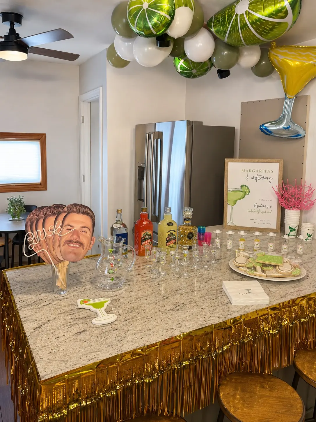 Margarita bar setup with signage and coordinated details