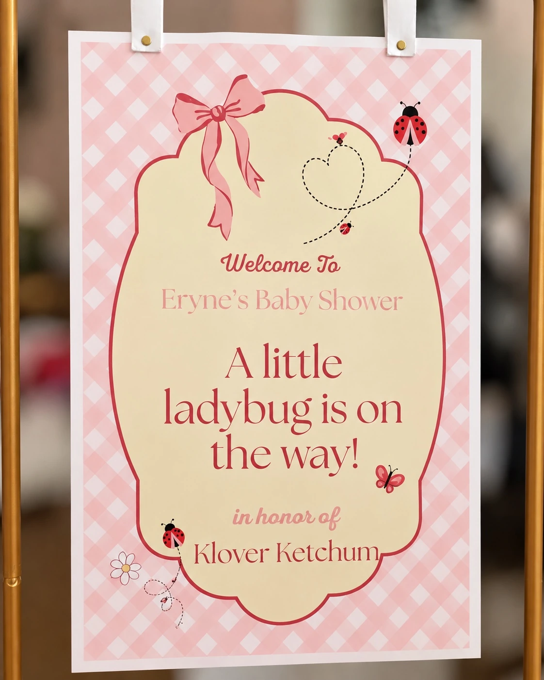 Welcome to Eryne's baby shower sign using the invitation design