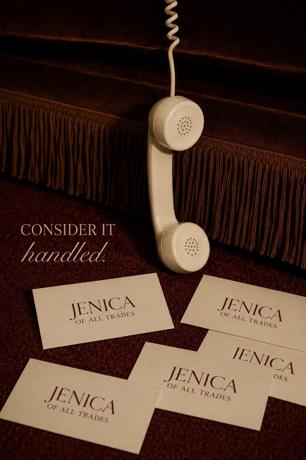 A burgundy telephone and Jenica of All Trades cards arranged for an editorial brand photograph