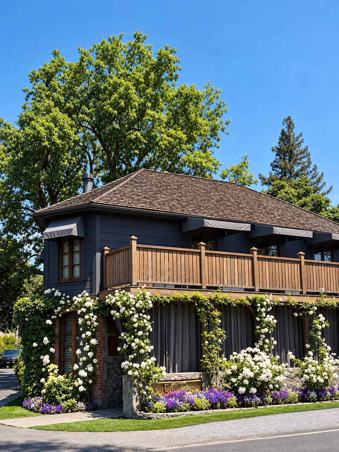 The French Laundry historic exterior in Yountville, surrounded by climbing white roses