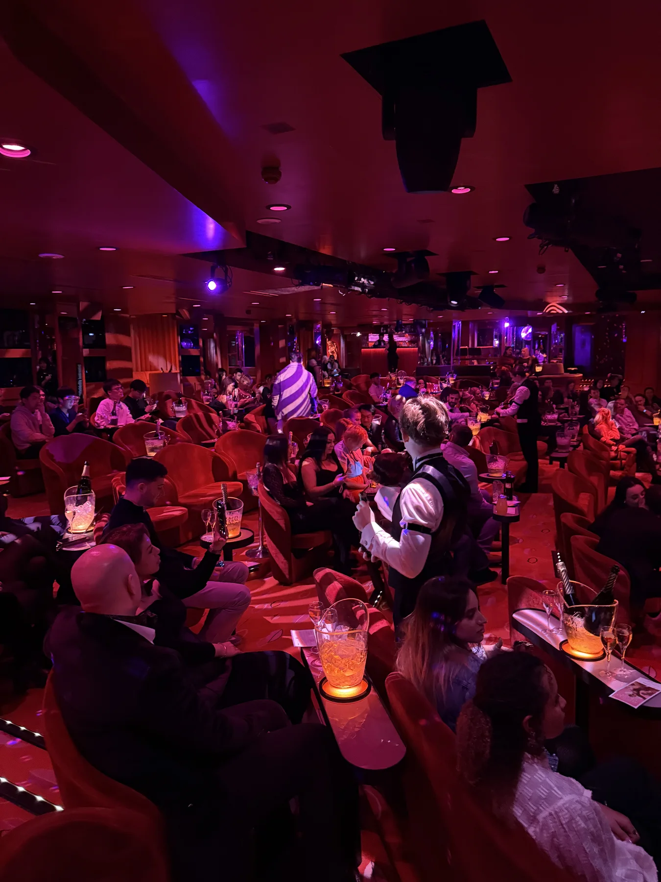 The audience and stage inside Crazy Horse Paris