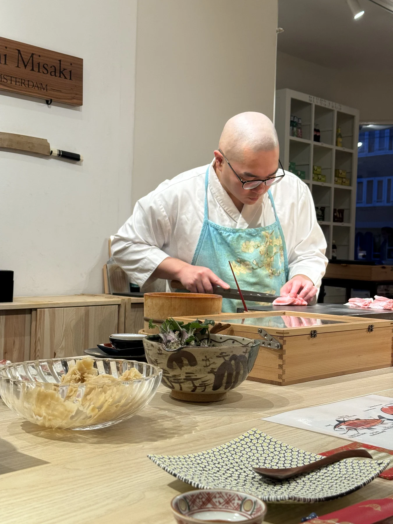 Chef preparing a course at Sushi Misaki
