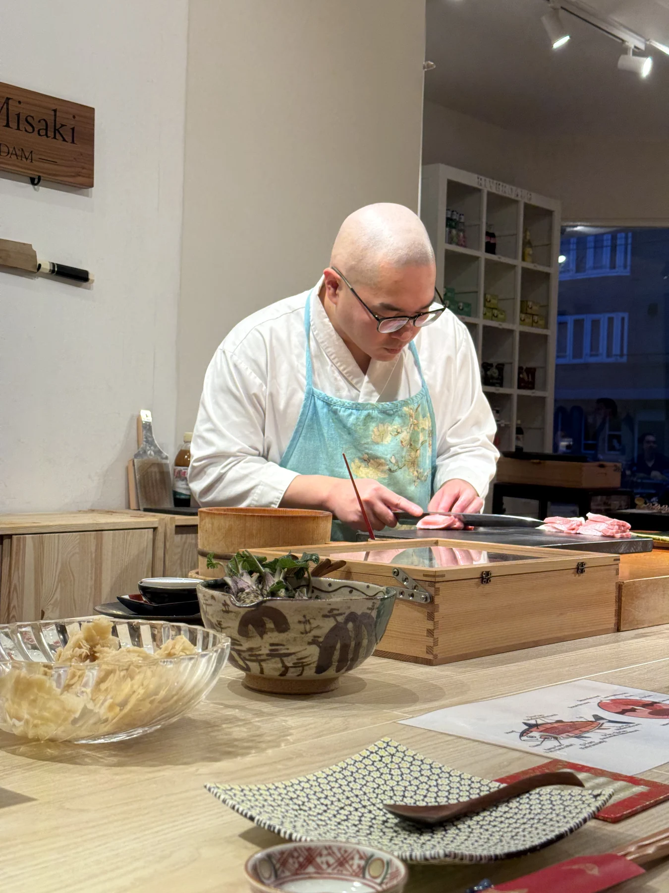 Chef preparing tuna at Sushi Misaki