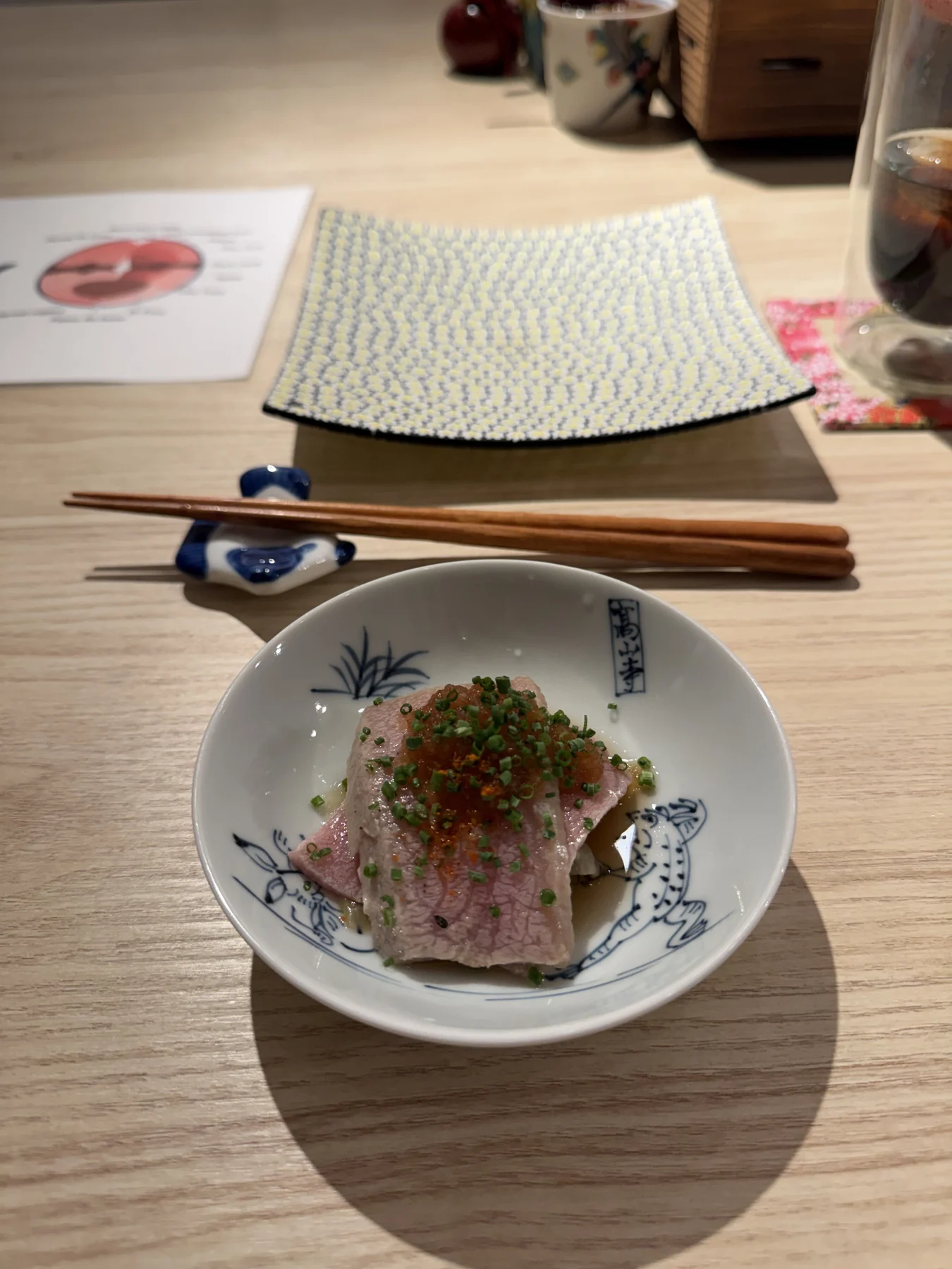 A plated tuna course at Sushi Misaki