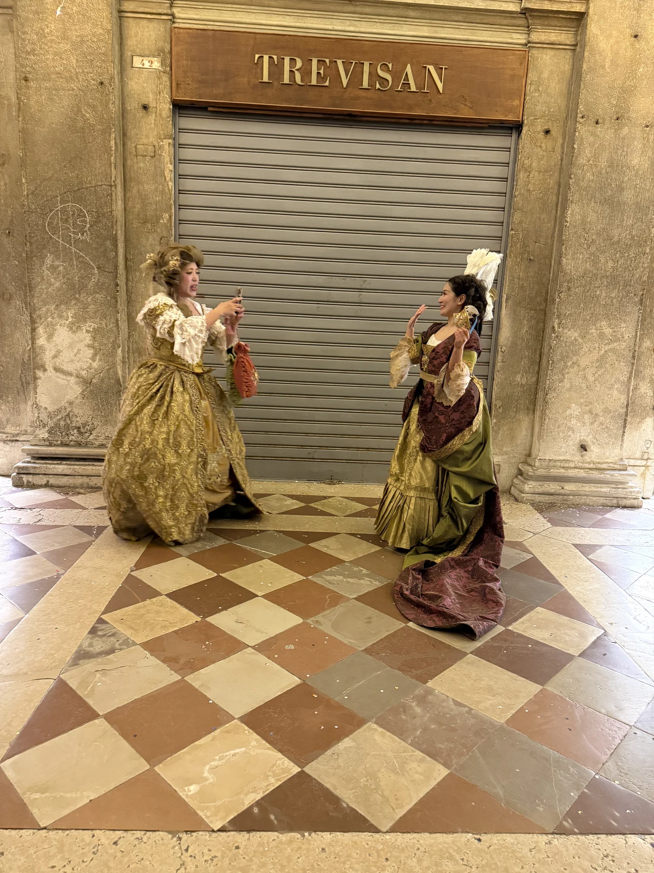 Costumed figures in Venice