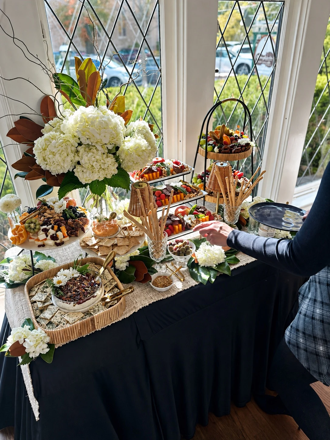 Hydrangea grazing table at a green tartan baby shower